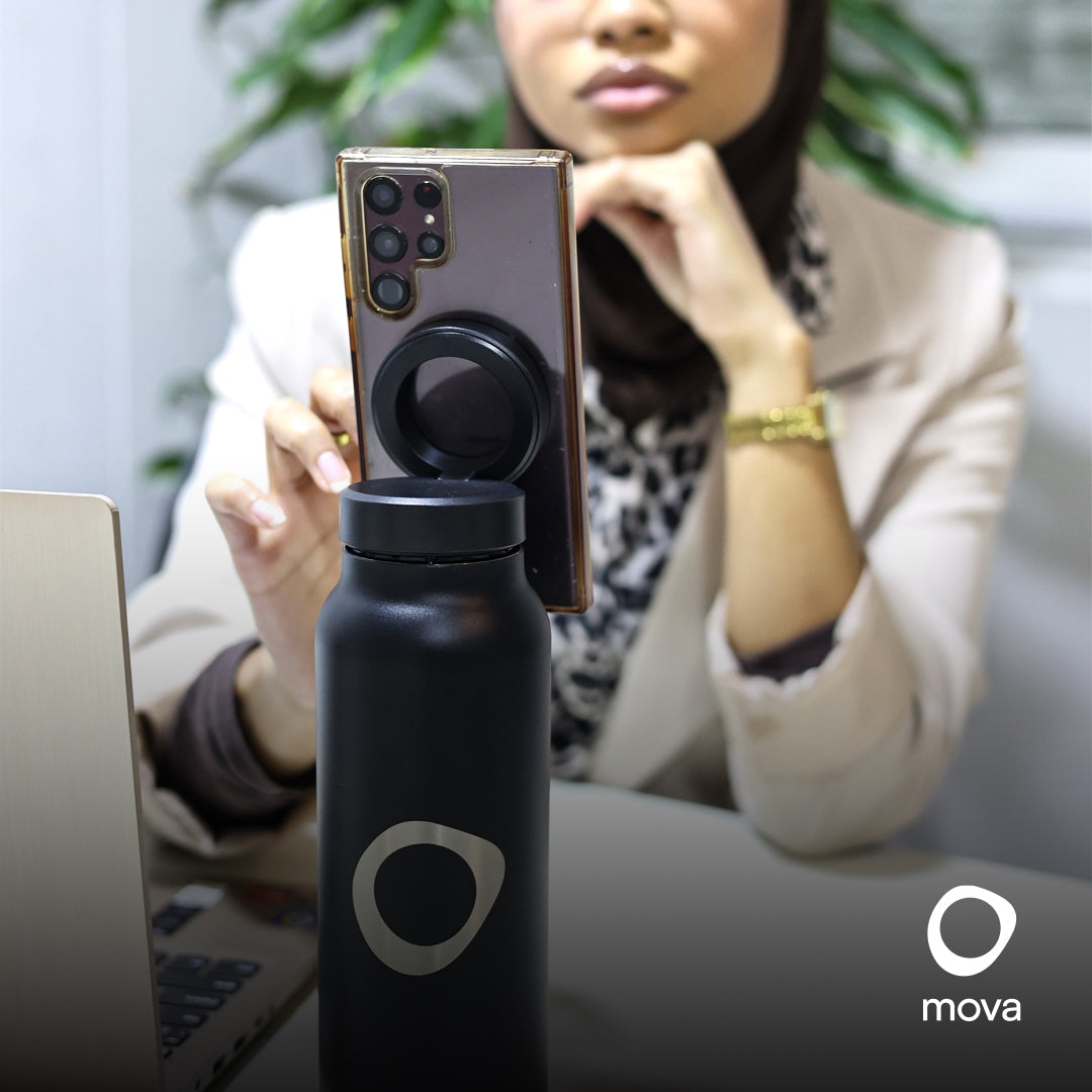 mova black insulated bottle in office setting
